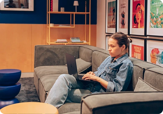 DashBook team on a sofa in Barcelona